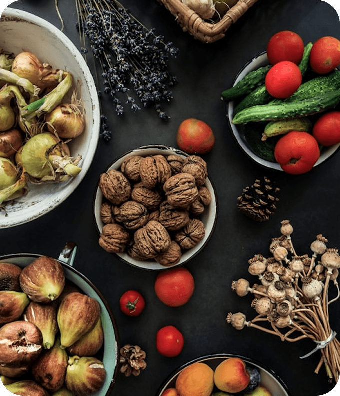 Rich curry and fresh garnishes served at Noshh